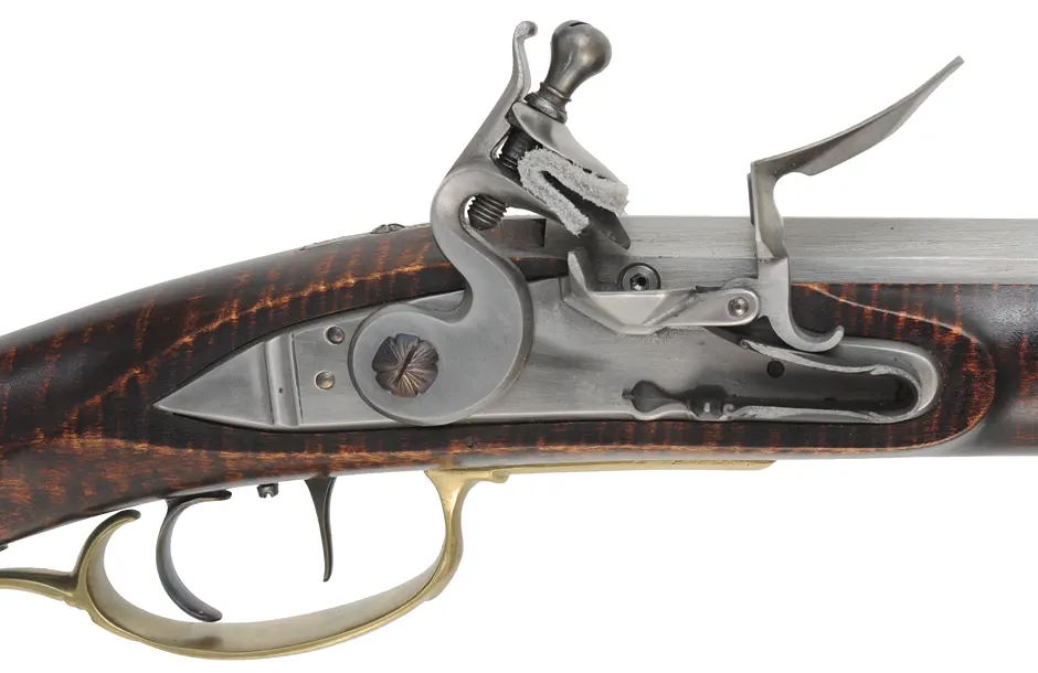 York County Longrifle,
.50 caliber, 42" straight octagon barrel,
flintlock, fancy curly maple, engraved brass,
used, by G.L. Jones