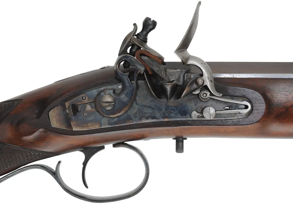 Mortimer Rifle,
.54 caliber, 35-1/2" octagon-to-round barrel,
flintlock, checkered walnut, iron trim, 
used, by Davide Pedersoli
