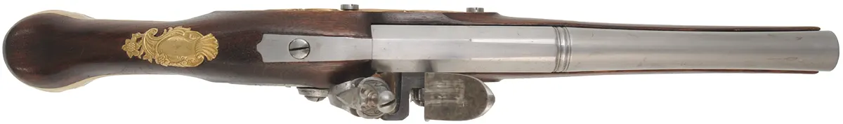 Holster Pistol,
.50 caliber, 10" octagon-to-round barrel,
TRS flintlock, walnut, brass trim,
new, by Ken Brady Holster Pistol,
.50 caliber, 10" octagon-to-round barrel,
TRS flintlock, walnut, brass trim,
new, by Ken Brady