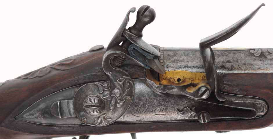 Antique R. Wilson Holster Pistol,
.64 caliber smooth bore, 8-3/4" barrel,
flintlock, walnut, iron,
antique parts, restocked