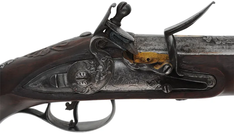 Antique R. Wilson Holster Pistol,
.64 caliber smooth bore, 8-3/4" barrel,
flintlock, walnut, iron,
antique parts, restocked Antique R. Wilson Holster Pistol,
.64 caliber smooth bore, 8-3/4" barrel,
flintlock, walnut, iron,
antique parts, restocked