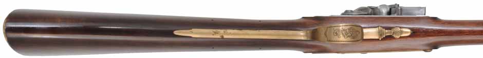 Fowling Gun,
20 gauge, 43" octagon-to-round barrel,
flintlock, walnut, engraved brass,
used, by R. W. Dietz Fowling Gun,
20 gauge, 43" octagon-to-round barrel,
flintlock, walnut, engraved brass,
used, by R. W. Dietz