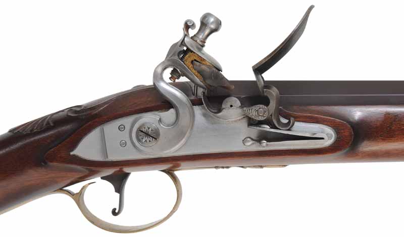 Fowling Gun,
20 gauge, 43" octagon-to-round barrel,
flintlock, walnut, engraved brass,
used, by R. W. Dietz Fowling Gun,
20 gauge, 43" octagon-to-round barrel,
flintlock, walnut, engraved brass,
used, by R. W. Dietz