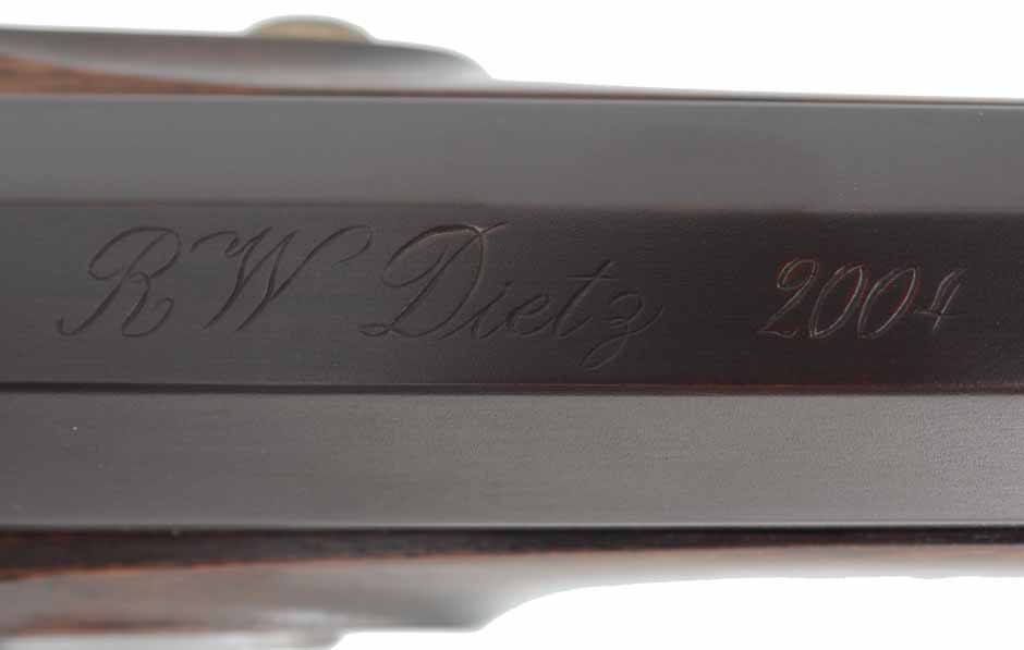 Fowling Gun,
20 gauge, 43" octagon-to-round barrel,
flintlock, walnut, engraved brass,
used, by R. W. Dietz Fowling Gun,
20 gauge, 43" octagon-to-round barrel,
flintlock, walnut, engraved brass,
used, by R. W. Dietz