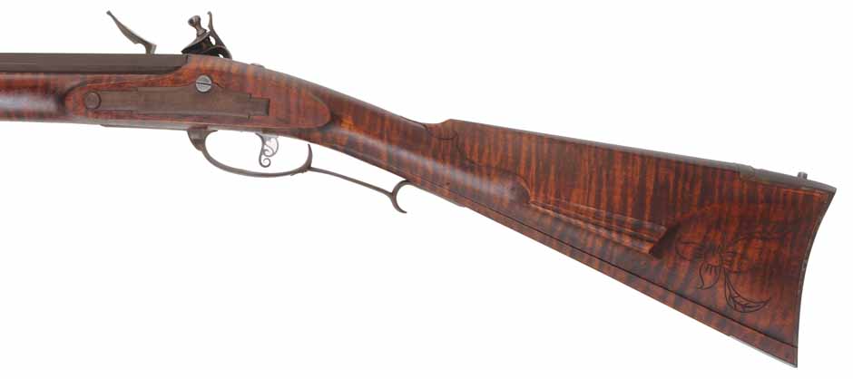 Lancaster Longrifle,
.40 caliber, 38" Getz swamped barrel,
Siler flintlock, curly maple, iron,
used, by J. Goodoien Lancaster Longrifle,
.40 caliber, 38" Getz swamped barrel,
Siler flintlock, curly maple, iron,
used, by J. Goodoien