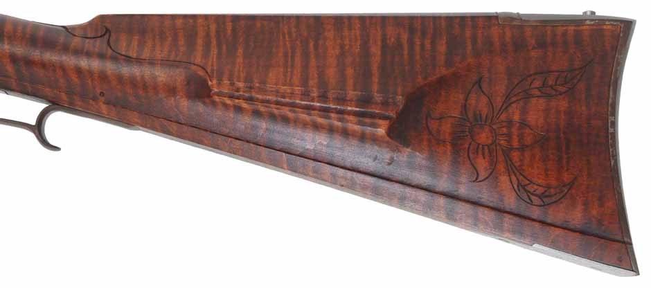 Lancaster Longrifle,
.40 caliber, 38" Getz swamped barrel,
Siler flintlock, curly maple, iron,
used, by J. Goodoien Lancaster Longrifle,
.40 caliber, 38" Getz swamped barrel,
Siler flintlock, curly maple, iron,
used, by J. Goodoien