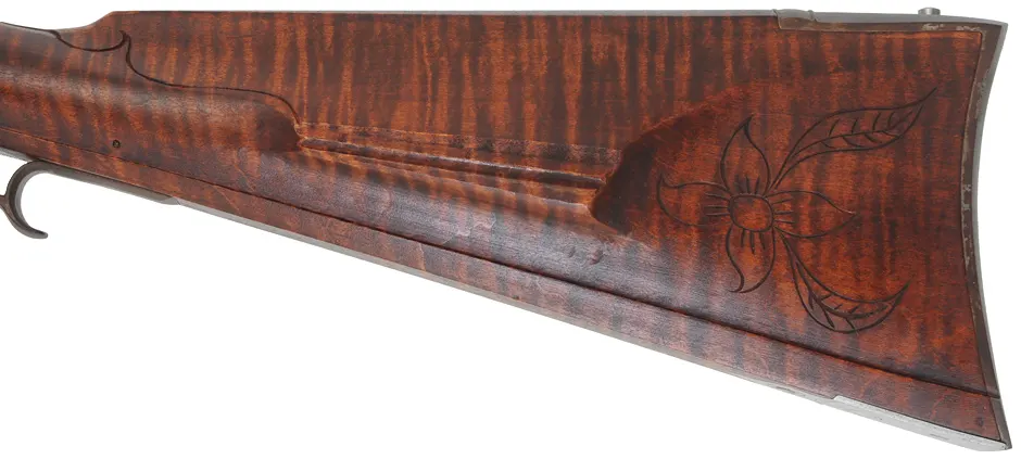 Lancaster Longrifle,
.40 caliber, 38" Getz swamped barrel,
Siler flintlock, curly maple, iron,
used, by J. Goodoien Lancaster Longrifle,
.40 caliber, 38" Getz swamped barrel,
Siler flintlock, curly maple, iron,
used, by J. Goodoien