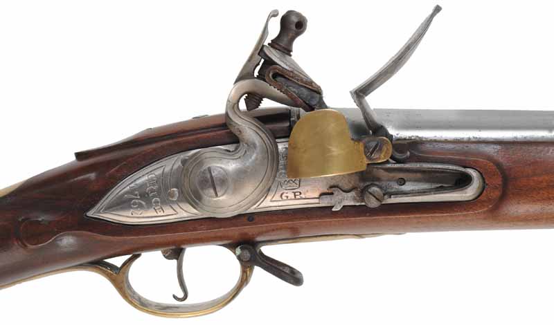 Brown Bess Musket,
.75 caliber, 42" barrel,
lock marked 1762 - GRICE, walnut, brass trim, 
flashguard, bayonet & cartridge box, used, by Davide Pedersoli,