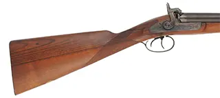 Double Barrel Shotgun,
12 gauge, 28" barrels,
percussion, checkered walnut, iron,
used by Pietta for Navy Arms Co.