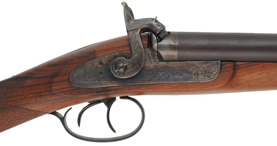 Double Barrel Shotgun,
12 gauge, 28" barrels,
percussion, checkered walnut, iron,
used by Pietta for Navy Arms Co. Double Barrel Shotgun,
12 gauge, 28" barrels,
percussion, checkered walnut, iron,
used by Pietta for Navy Arms Co.