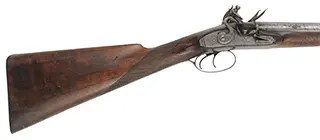 Antique Double Shotgun,
24 gauge, 36" Damascus barrels,
walnut, iron trim, flintlocks marked E & W Bond