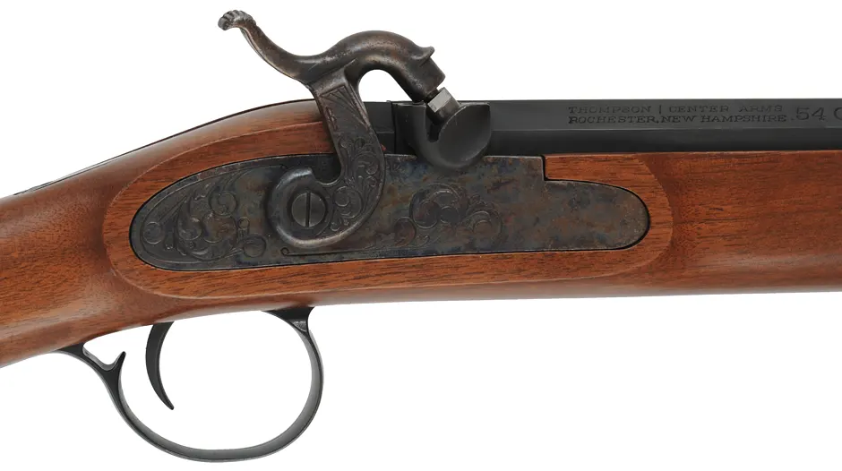 T/C White Mountain Carbine,
 .54 caliber, 21" octagon-to-round barrel, 
percussion, walnut, iron, 
used by Thompson Center Arms