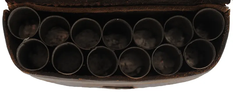 Antique Militia Cartridge Pouch,
4-5/8" wide by 2-3/4" tall, 
leather, 13 tubes, missing button
