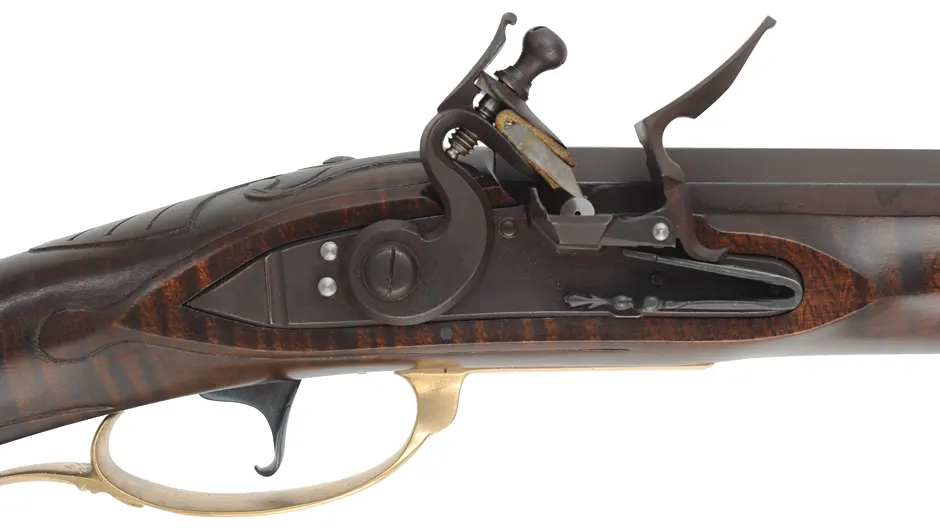 Reading, Pennsylvania Smoothrifle,
20 gauge, 42" octagon-to-round barrel,
flintlock, maple, brass,
new, by G. Rasche Reading, Pennsylvania Smoothrifle,
20 gauge, 42" octagon-to-round barrel,
flintlock, maple, brass,
new, by G. Rasche
