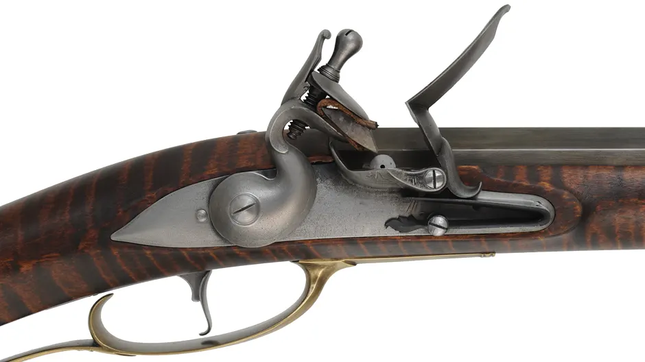 Colonial Longrifle,
.54 caliber, 43-1/2" Rice swamped barrel,
Chambers flintlock, curly maple, brass, used Colonial Longrifle,
.54 caliber, 43-1/2" Rice swamped barrel,
Chambers flintlock, curly maple, brass, used