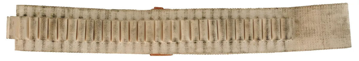 Cartridge Belt 
3" canvas belt with loops for .45-70 Gov't cartridges, 
used, by C. Sharps Arms Co.