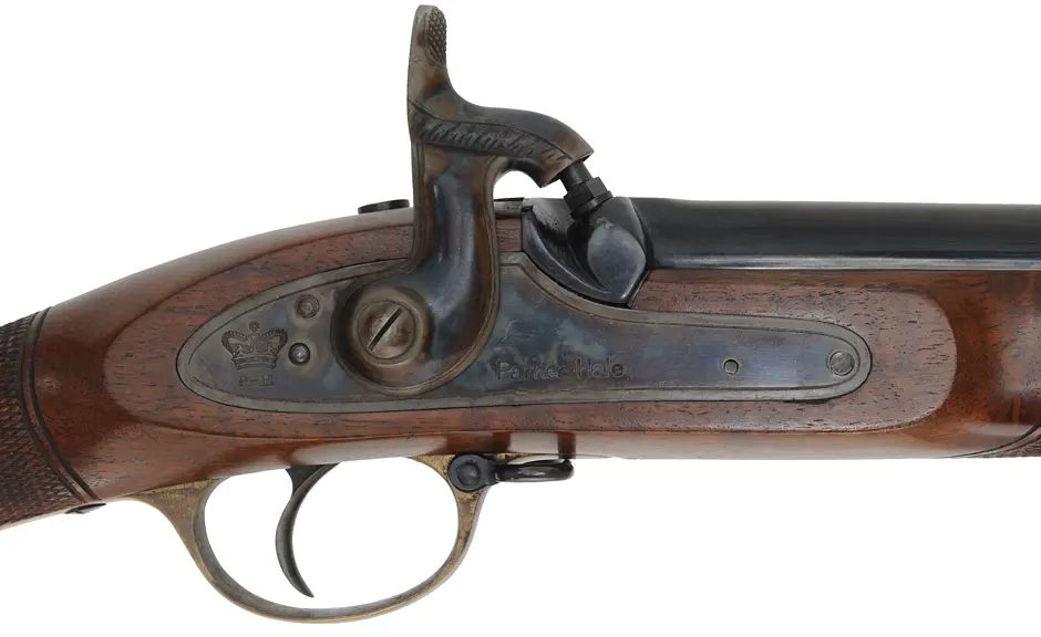 Enfield Volunteer Rifle,
.451 caliber fast twist for bullet, 33" barrel,
percussion, checkered walnut, two band,
used, made in England by Parker Hale Enfield Volunteer Rifle,
.451 caliber fast twist for bullet, 33" barrel,
percussion, checkered walnut, two band,
used, made in England by Parker Hale