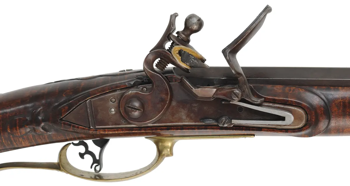 Bucks County Longrifle,
.45 caliber, 43-1/2" octagon barrel,
R. Gale flintlock, curly maple, brass with side opening patchbox,
used, signed R.E. Grieder Bucks County Longrifle,
.45 caliber, 43-1/2" octagon barrel,
R. Gale flintlock, curly maple, brass with side opening patchbox,
used, signed R.E. Grieder