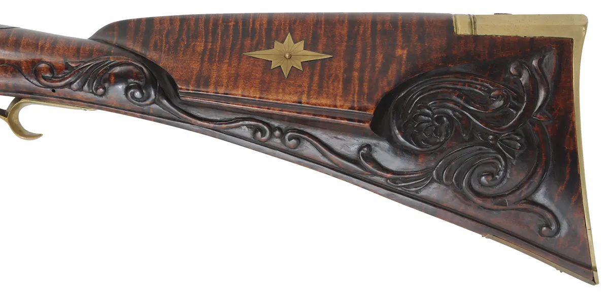 Bucks County Longrifle,
.45 caliber, 43-1/2" octagon barrel,
R. Gale flintlock, curly maple, brass with side opening patchbox,
used, signed R.E. Grieder Bucks County Longrifle,
.45 caliber, 43-1/2" octagon barrel,
R. Gale flintlock, curly maple, brass with side opening patchbox,
used, signed R.E. Grieder