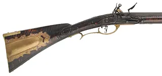 Bucks County Longrifle,
.45 caliber, 42" G.R. Douglas XX swamped octagon barrel,
Siler flintlock, curly maple, brass with side opening patchbox,
used, signed R.E. Grieder