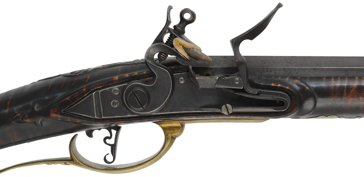 Bucks County Longrifle,
.45 caliber, 42" G.R. Douglas XX swamped octagon barrel,
Siler flintlock, curly maple, brass with side opening patchbox,
used, signed R.E. Grieder Bucks County Longrifle,
.45 caliber, 42" G.R. Douglas XX swamped octagon barrel,
Siler flintlock, curly maple, brass with side opening patchbox,
used, signed R.E. Grieder