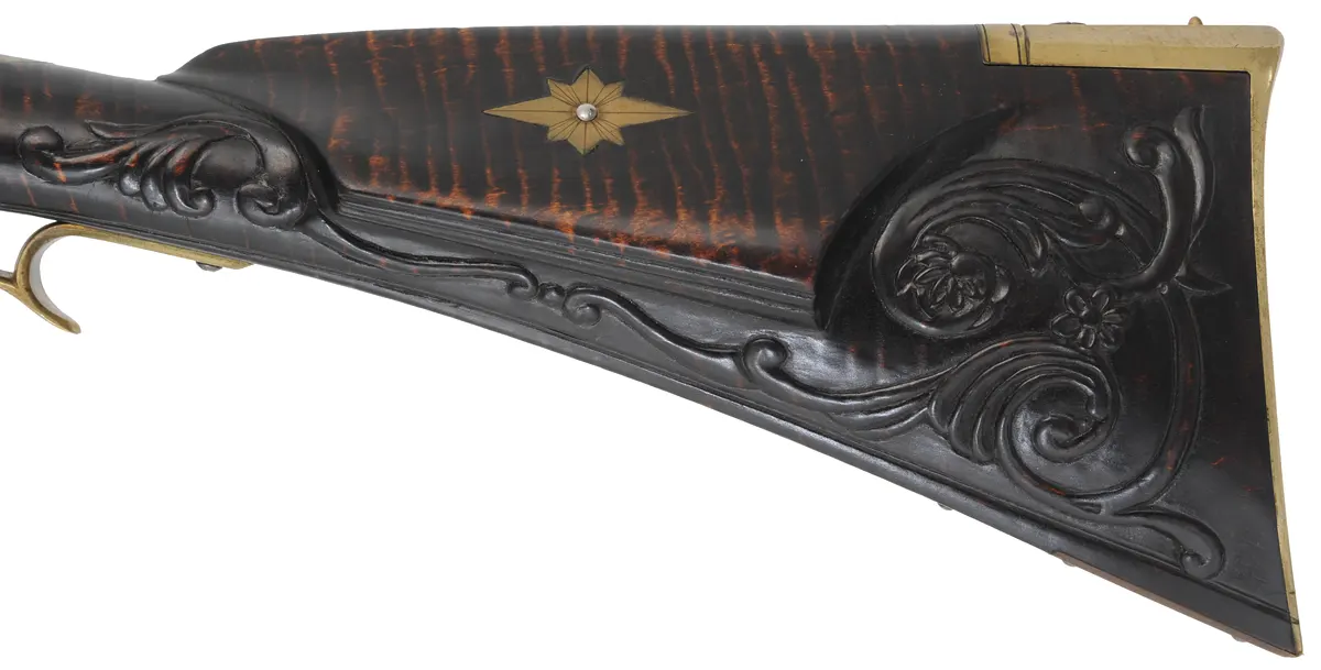 Bucks County Longrifle,
.45 caliber, 42" G.R. Douglas XX swamped octagon barrel,
Siler flintlock, curly maple, brass with side opening patchbox,
used, signed R.E. Grieder Bucks County Longrifle,
.45 caliber, 42" G.R. Douglas XX swamped octagon barrel,
Siler flintlock, curly maple, brass with side opening patchbox,
used, signed R.E. Grieder