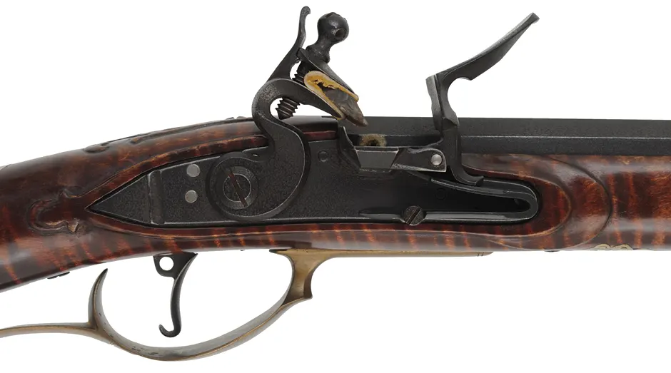 Herman Rupp,
Allentown – Bethlehem longrifle,
.45 caliber, 42” barrel, 
maple, brass trim & wire inlay,
used, by R.E. Grieder