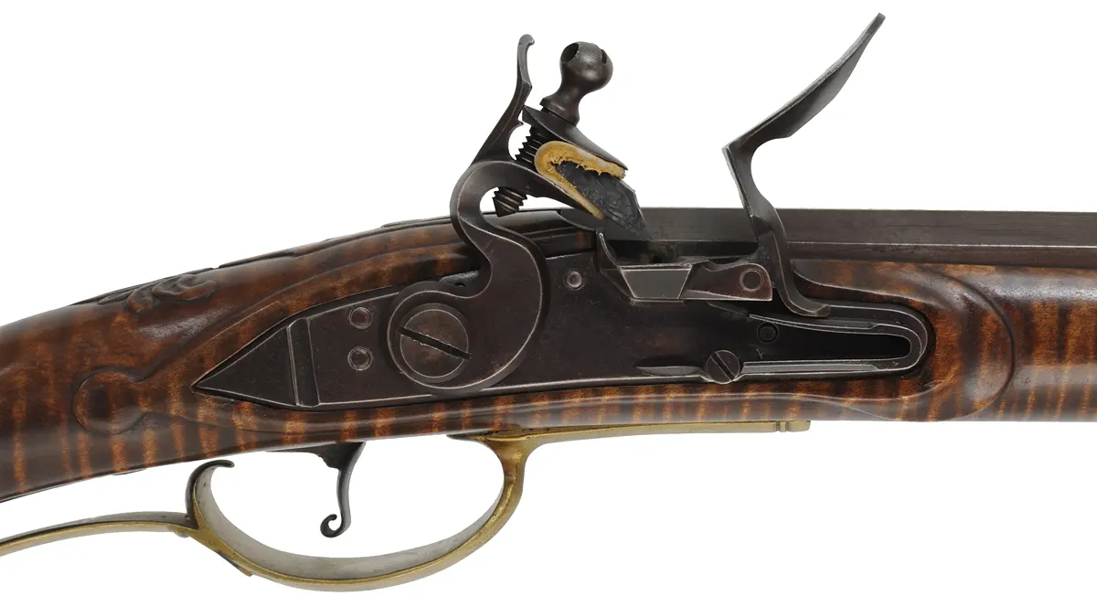 Berks County, Pennsylvania Longrifle,
.45 caliber, 42" straight octagon barrel,
large Siler flintlock, curly maple, brass,
used, signed R. Grieder Berks County, Pennsylvania Longrifle,
.45 caliber, 42" straight octagon barrel,
large Siler flintlock, curly maple, brass,
used, signed R. Grieder