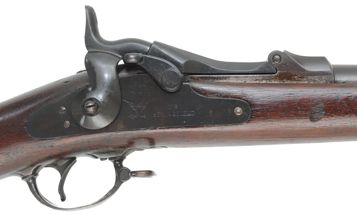 U.S. Model 1873 Springfield Infantry Rifle
caliber .45-70 Gov't, 32" barrel,
cracked walnut stock, aged patina, bright bore U.S. Model 1873 Springfield Infantry Rifle
caliber .45-70 Gov't, 32" barrel,
cracked walnut stock, aged patina, bright bore