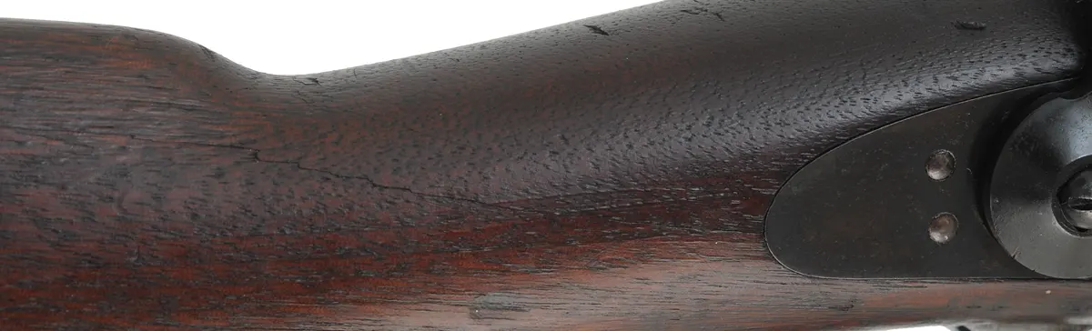 U.S. Model 1873 Springfield Infantry Rifle
caliber .45-70 Gov't, 32" barrel,
cracked walnut stock, aged patina, bright bore U.S. Model 1873 Springfield Infantry Rifle
caliber .45-70 Gov't, 32" barrel,
cracked walnut stock, aged patina, bright bore
