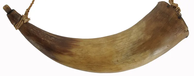 Group of Four Antique Powder Horns
in various condition, sold as is