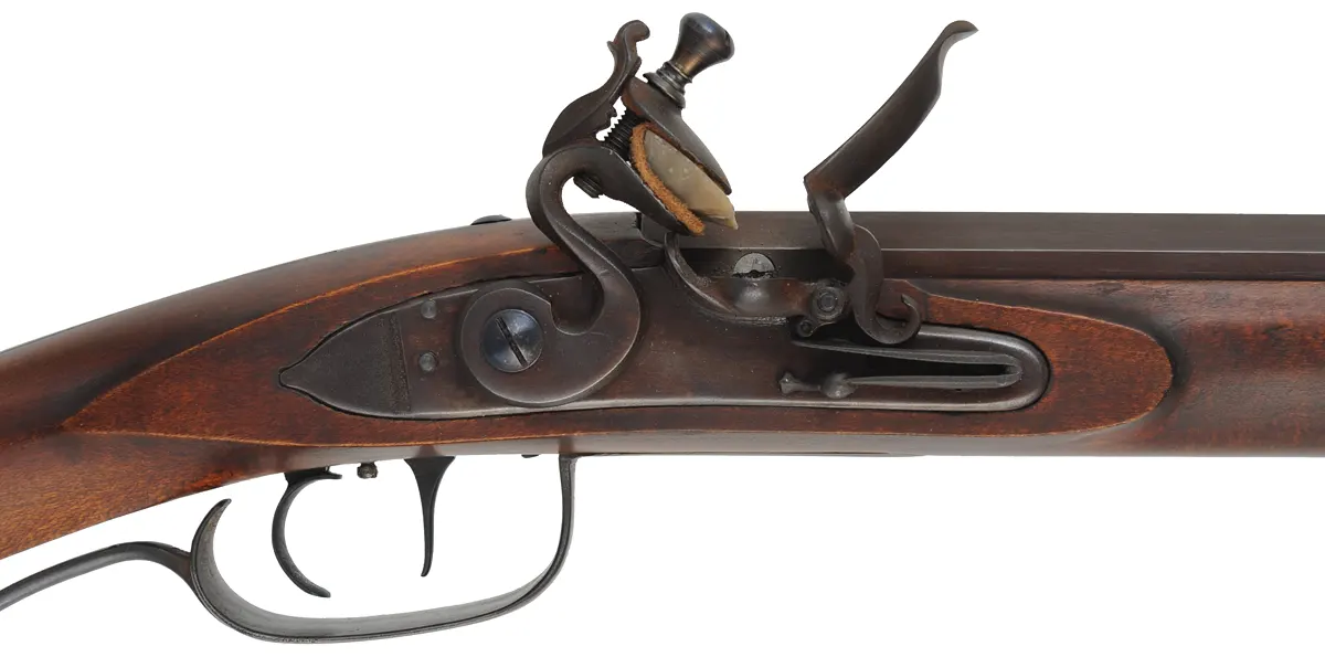Southern Mountain Longrifle,
.50 caliber, 42" Colerain barrel,
L&R Durs Egg flintlock, maple, iron trim,
new, unfired, signed by George Nelson Southern Mountain Longrifle,
.50 caliber, 42" Colerain barrel,
L&R Durs Egg flintlock, maple, iron trim,
new, unfired, signed by George Nelson
