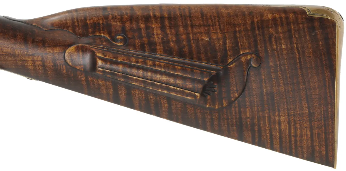 J. Faber, Virginia Longrifle,
.58 caliber, 43-1/2" swamped octagon barrel,
curly maple, brass furniture, sliding wooden patchbox, 
used, signed by Michael Hayes