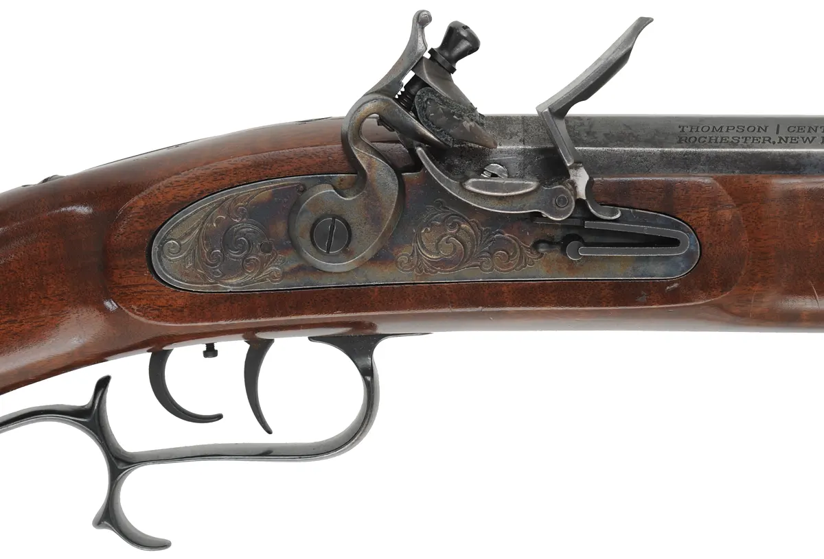 Renegade Rifle,
.50 caliber, 26" barrel, 
flintlock, patridge sights, walnut stock,
used, by Thompson Center