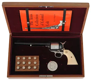 Colt Sesquicentennial Model 1873 Single Action Army Revolver,
.45 Colt, 7-1/2" barrel,
blued, engraved, fitted wood display case,
by Colt Firearms Mfg. Co. Colt Sesquicentennial Model 1873 Single Action Army Revolver,
.45 Colt, 7-1/2" barrel,
blued, engraved, fitted wood display case,
by Colt Firearms Mfg. Co.
