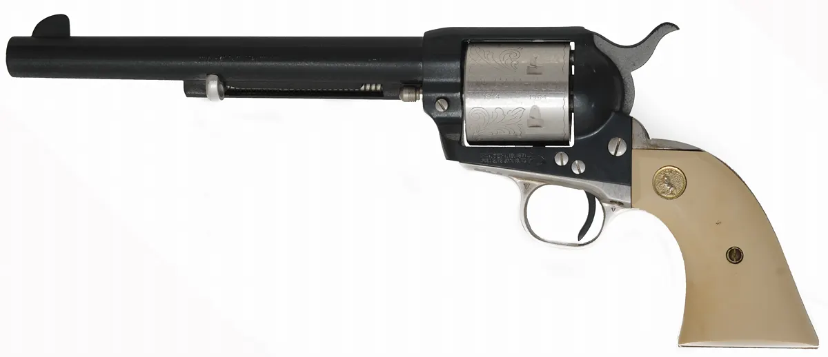 Colt Sesquicentennial Model 1873 Single Action Army Revolver,
.45 Colt, 7-1/2" barrel,
blued, engraved, fitted wood display case,
by Colt Firearms Mfg. Co. Colt Sesquicentennial Model 1873 Single Action Army Revolver,
.45 Colt, 7-1/2" barrel,
blued, engraved, fitted wood display case,
by Colt Firearms Mfg. Co.