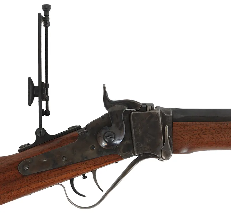 Little Sharps Rifle
caliber .22 Long Rifle, 28" barrel,
Chiappa action, walnut, pewter forend
tang sight, globe front sight, used
