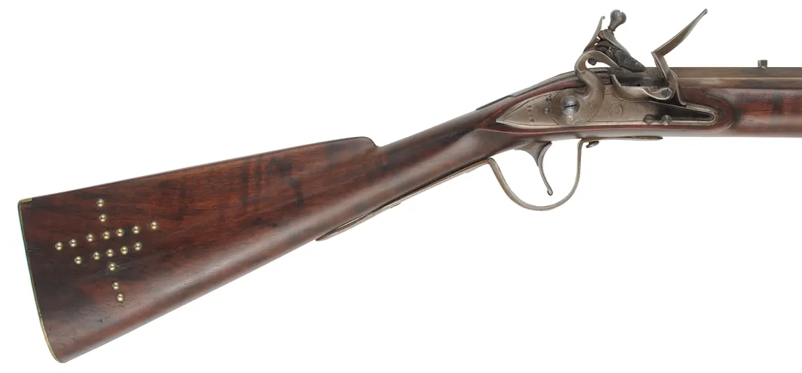 Northwest Trade Gun,
20 gauge, 32" tapered octagon-to-round barrel,
L&R flintlock, walnut, brass & iron, tacks, used Northwest Trade Gun,
20 gauge, 32" tapered octagon-to-round barrel,
L&R flintlock, walnut, brass & iron, tacks, used