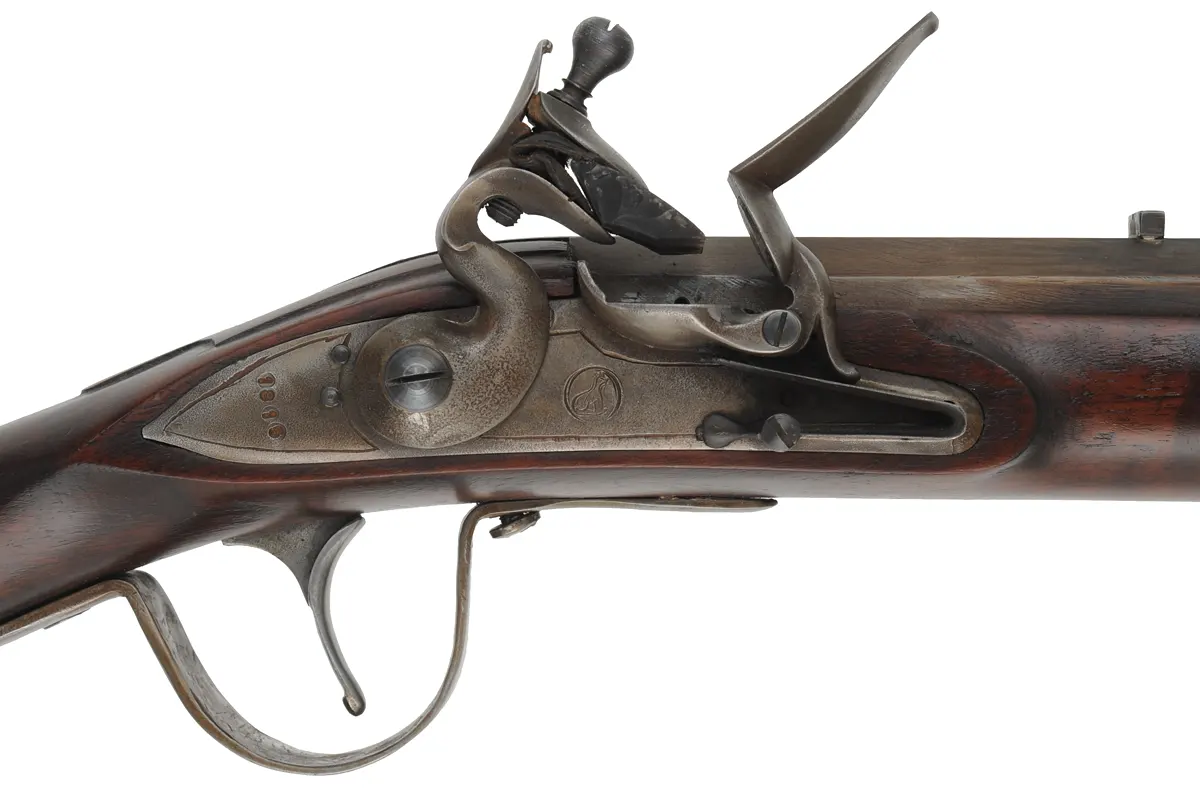 Northwest Trade Gun,
20 gauge, 32" tapered octagon-to-round barrel,
L&R flintlock, walnut, brass & iron, tacks, used Northwest Trade Gun,
20 gauge, 32" tapered octagon-to-round barrel,
L&R flintlock, walnut, brass & iron, tacks, used