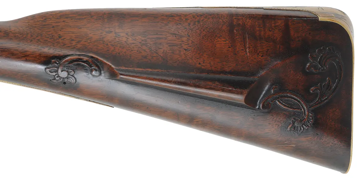 Southern Longrifle,
.50 caliber coned muzzle, 42" swamped barrel,
flintlock, curly maple, engraved brass trim,
used, by Robert Harn Southern Longrifle,
.50 caliber coned muzzle, 42" swamped barrel,
flintlock, curly maple, engraved brass trim,
used, by Robert Harn