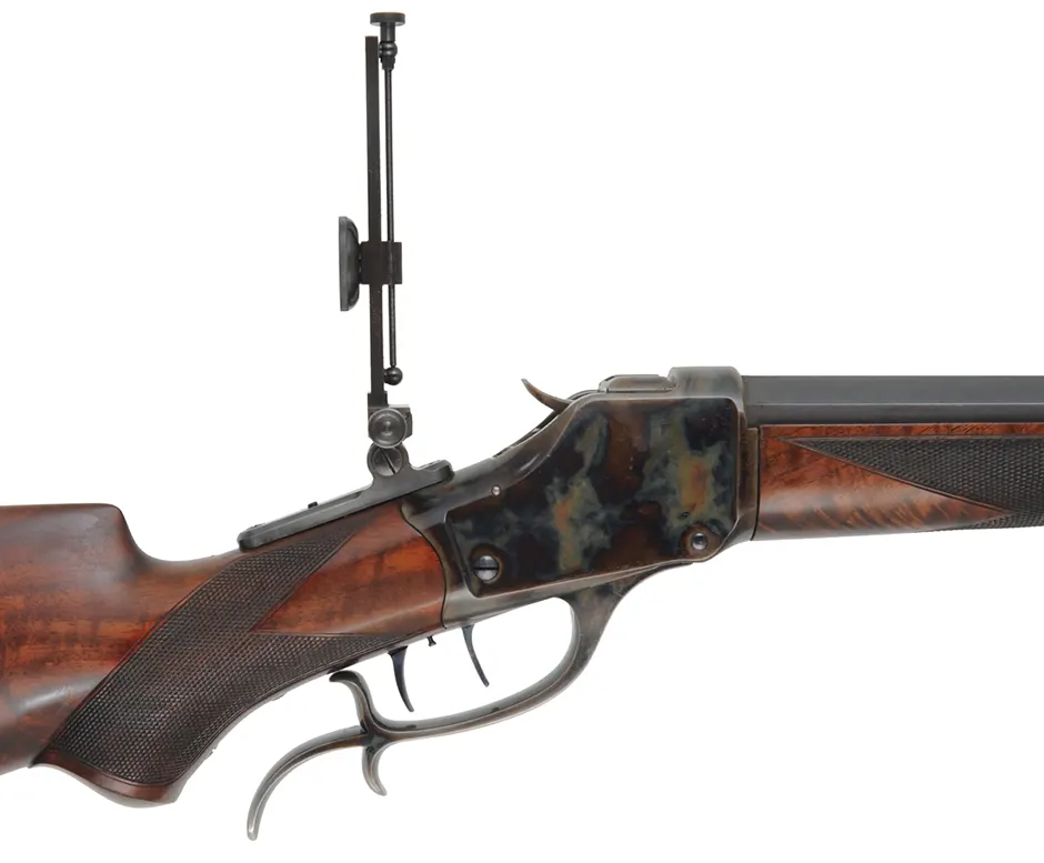 1885 Winchester High Wall Rifle,
caliber .40-65 Ron Long, 29-1/2" Ron Long barrel, 
figured walnut, iron, double set triggers,
used, attributed to Ron Long