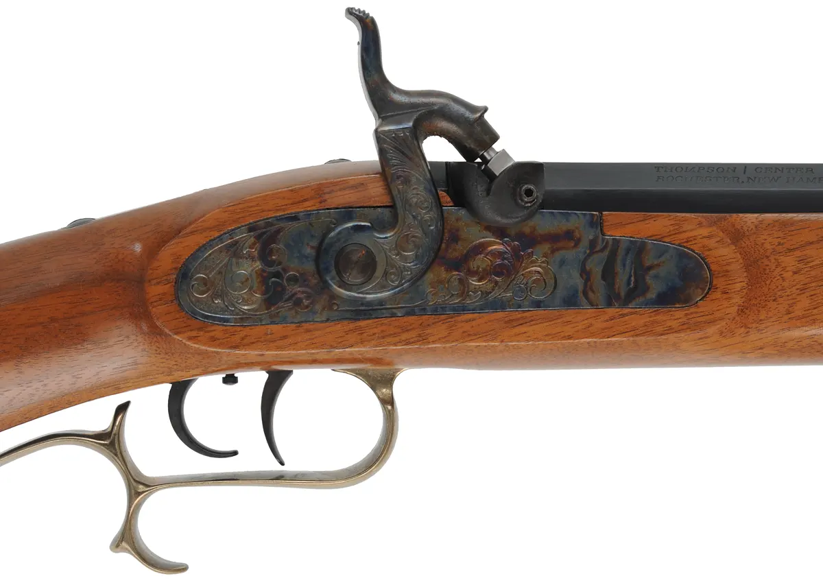 T/C Hawken Rifle,
.50 caliber,  28" barrel,
percussion, walnut, brass, 
used by Thompson Center Arms T/C Hawken Rifle,
.50 caliber,  28" barrel,
percussion, walnut, brass, 
used by Thompson Center Arms