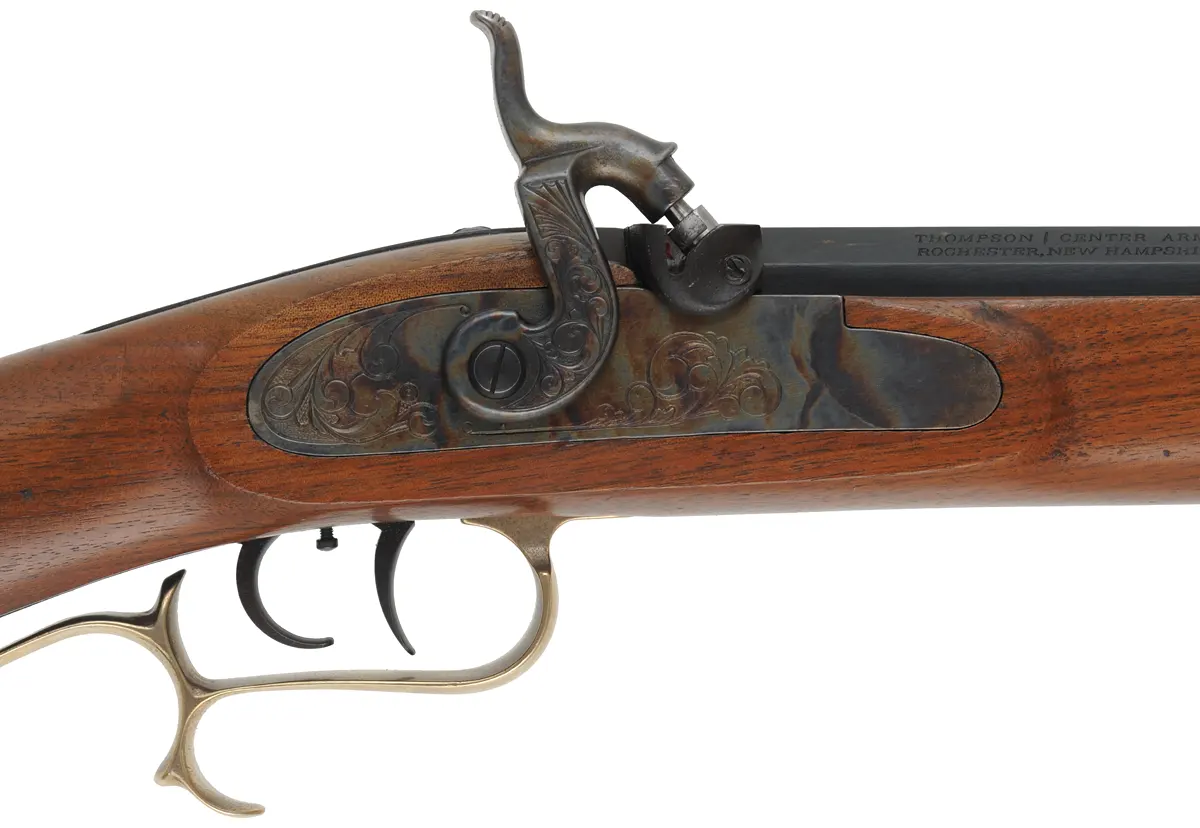 T/C Hawken Rifle,
.50 caliber,  28" barrel,
percussion, walnut, brass, 
used by Thompson Center Arms