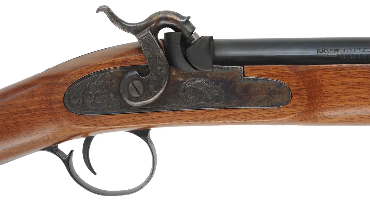 Thompson Center New Englander Shotgun,
12 gauge with screw in choke, 27" barrel,
percussion, walnut, iron trim, sling mounts, used