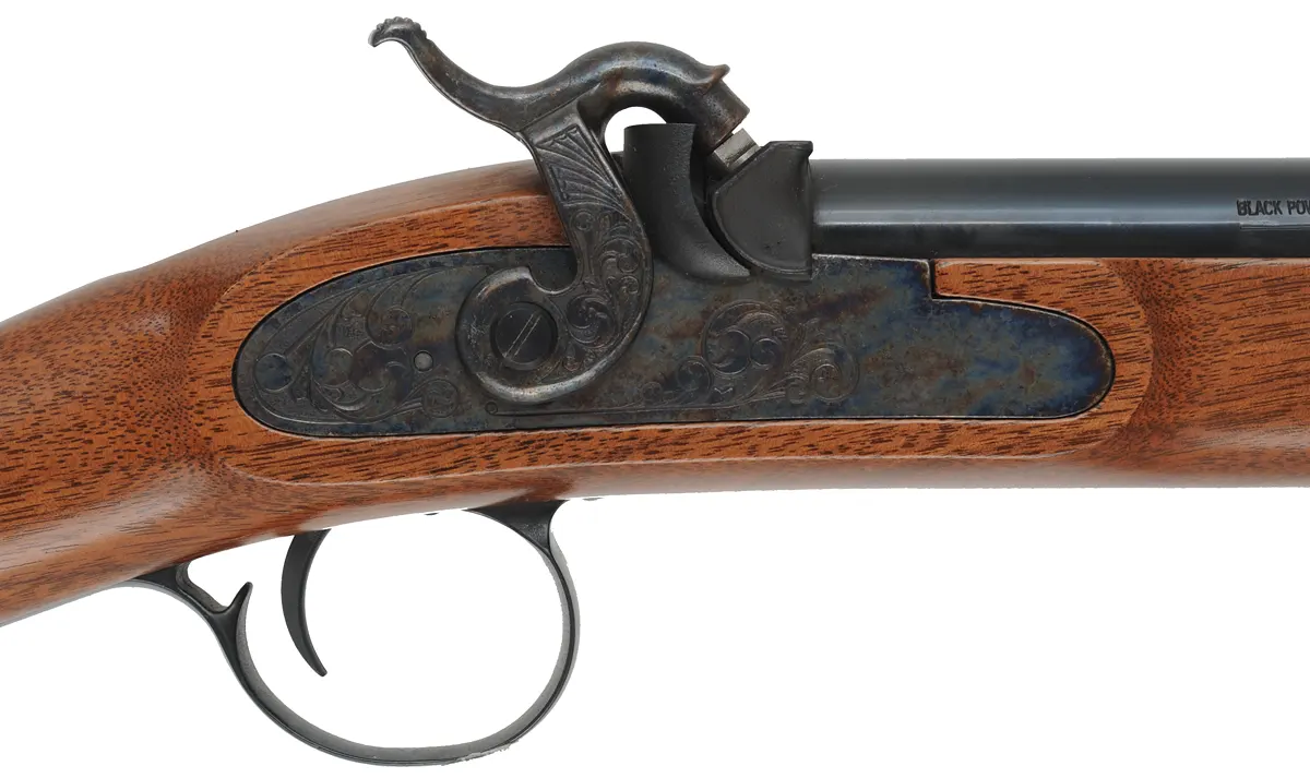 T/C New Englander Rifle,
.50 caliber, 26" barrel,
percussion, walnut, iron trim, 
used, by Thompson Center Arms