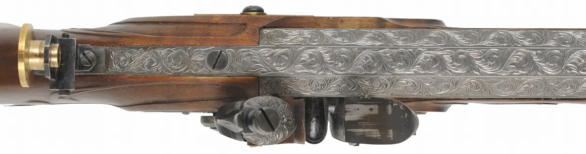 Schuetzen Offhand Target Rifle,
.40 caliber, 31" Oregon Rifle Works barrel,
walnut, brass furniture, globe & tang sight,
palm rest, engraved, by B. Raby