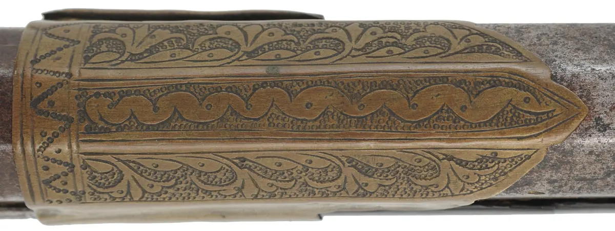 Antique Miquelet Musket, 
.60 caliber smoothbore, 54-1/2" barrel,
Miquelet flintlock, engraved steel & brass trim