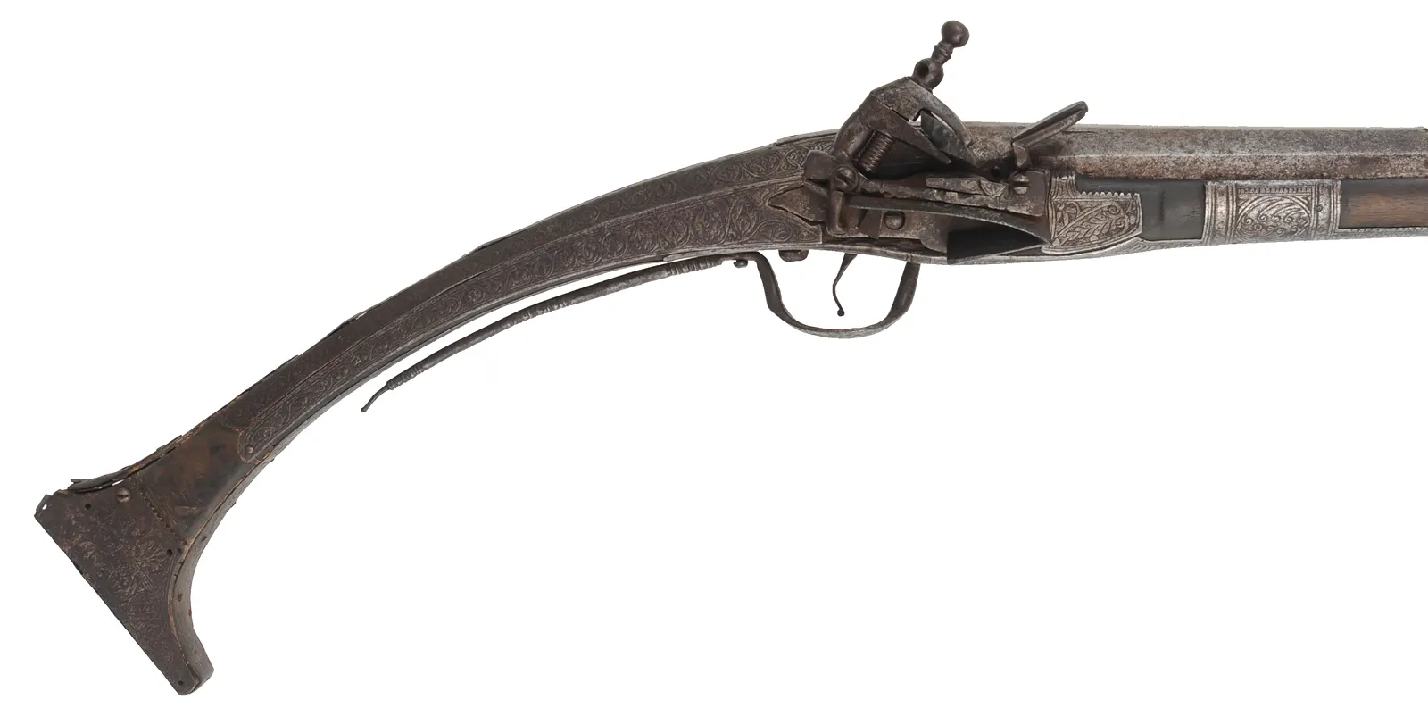 Antique Miquelet Musket, 
.60 caliber smoothbore, 54-1/2" barrel,
Miquelet flintlock, engraved steel & brass trim