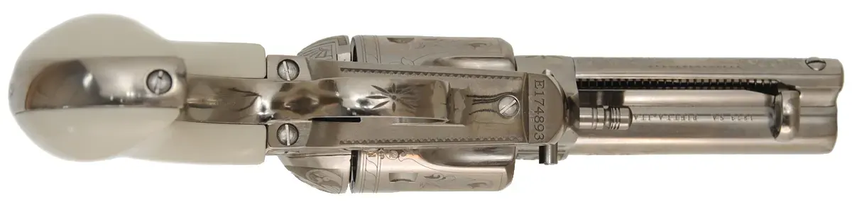 Pietta1873 Single Action "Huckleberry",
caliber .45 Colt, 3-1/2" barrel,
nickel finish, engraved, faux ivory grips,
as-new, by Pietta~ Italy