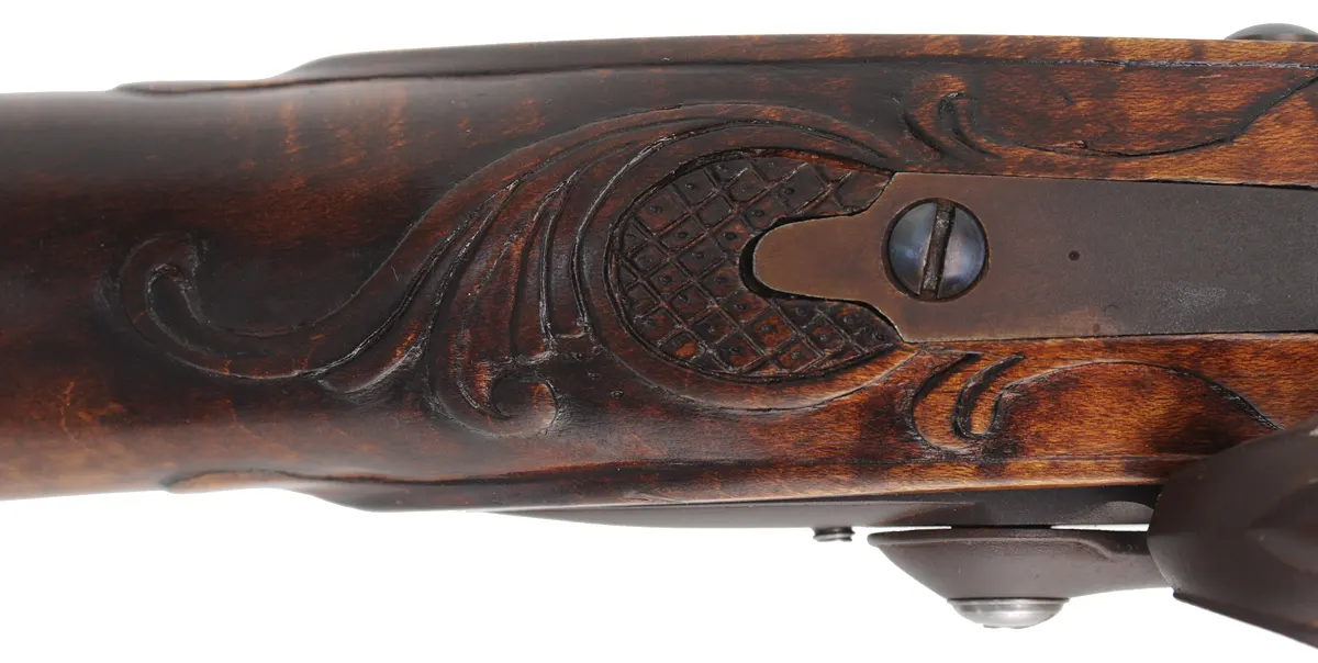 Virginia Longrifle,
.50 caliber, 38" Rice swamped barrel, 
Chambers flintlock, curly maple, engraved brass,
signed by J. Bohan